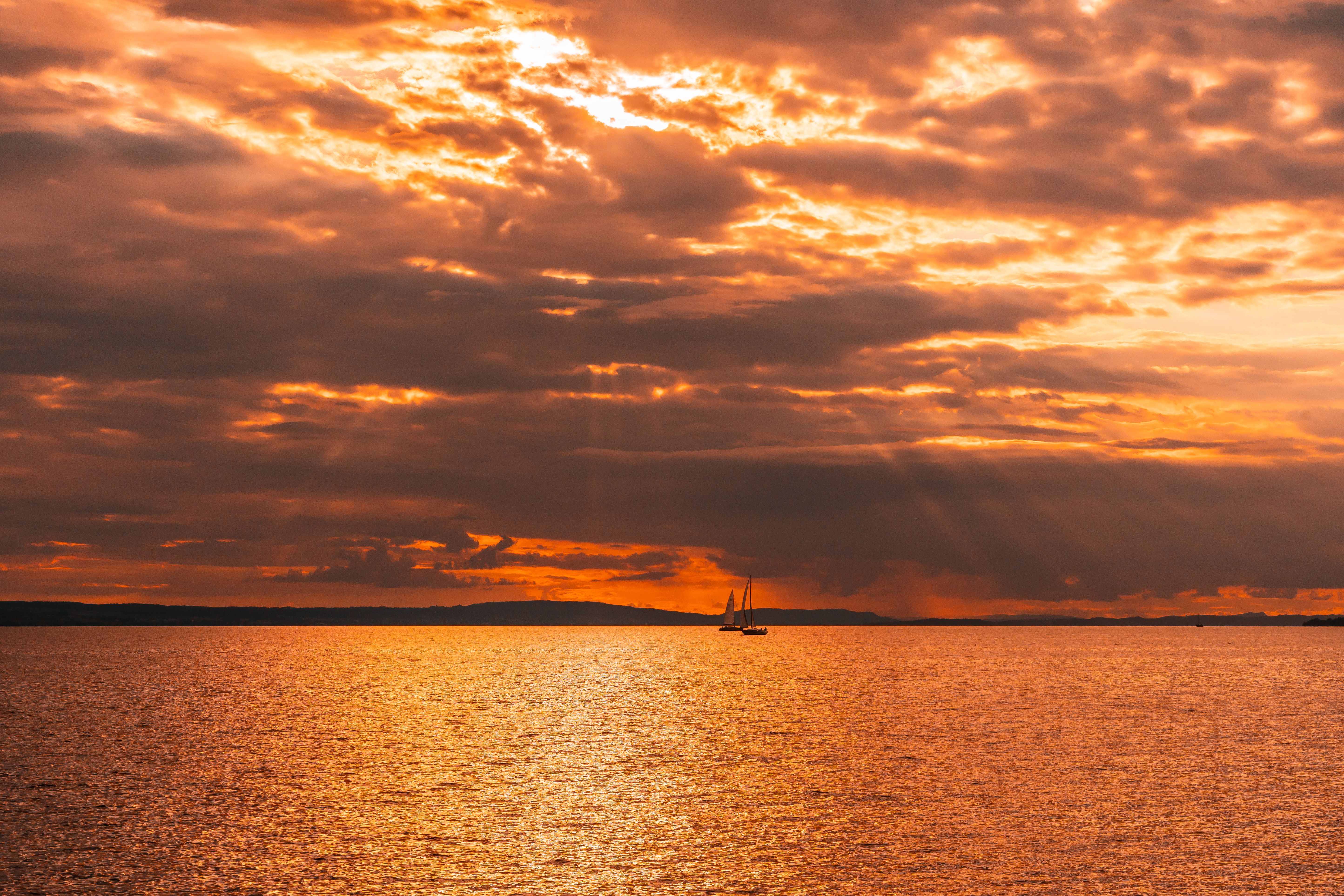 Clouds on Yellow Sky over Lake at Sunset · Free Stock Photo