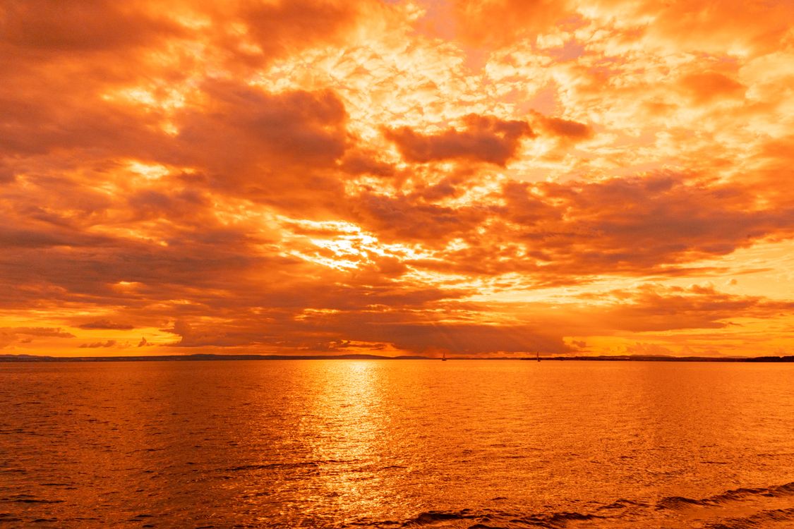 Clouds on Yellow Sky over Lake at Sunset · Free Stock Photo