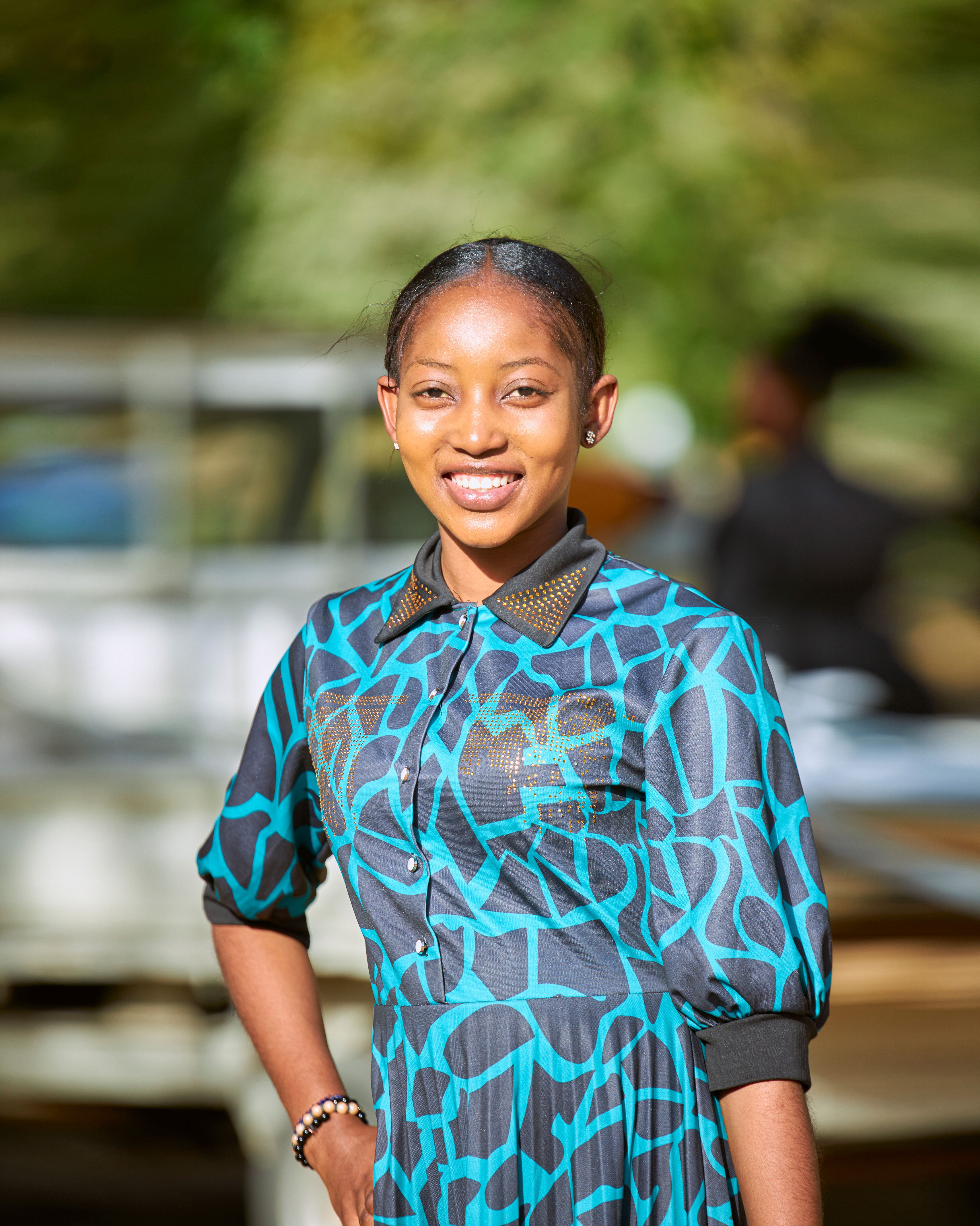 Smiling Woman in Black and Blue Shirt · Free Stock Photo