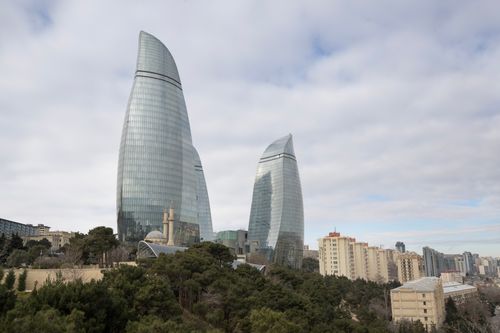 Free Stunning view of Baku's Flame Towers with surrounding urban park and cityscape. Stock Photo