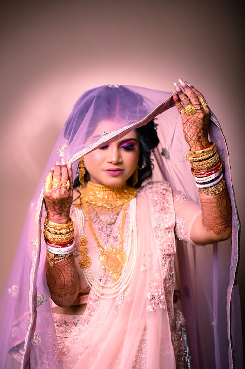 A beautiful indian bride in a pink sari