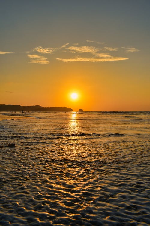 Sunset Sunlight over Sea Shore