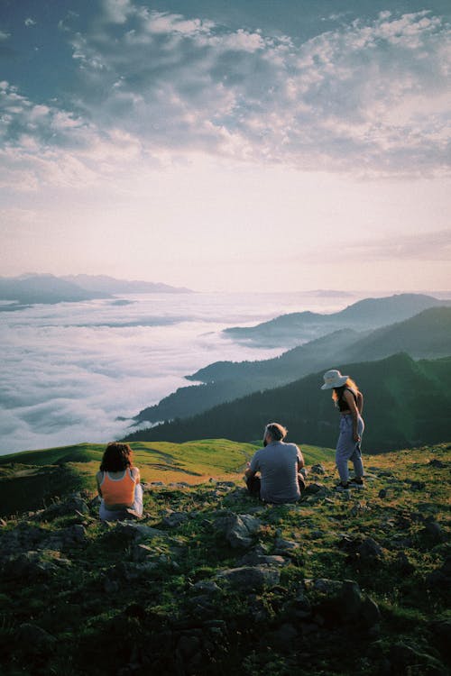 Man and Women on Hill with Cloud below