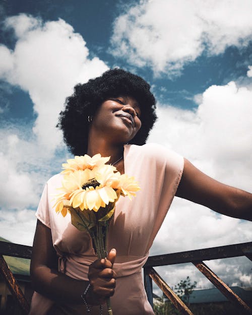 Portrait of Smiling Woman with Flowers