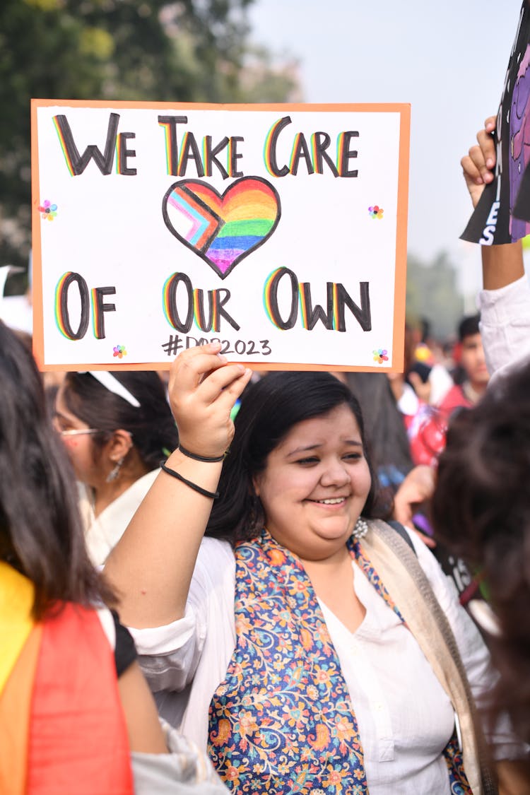 Smiling Woman With Banner