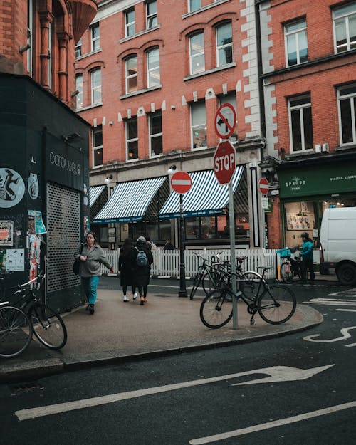 People on Sidewalk in City