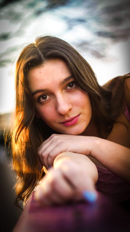 Young Woman Posing Outside in Sunlight · Free Stock Photo