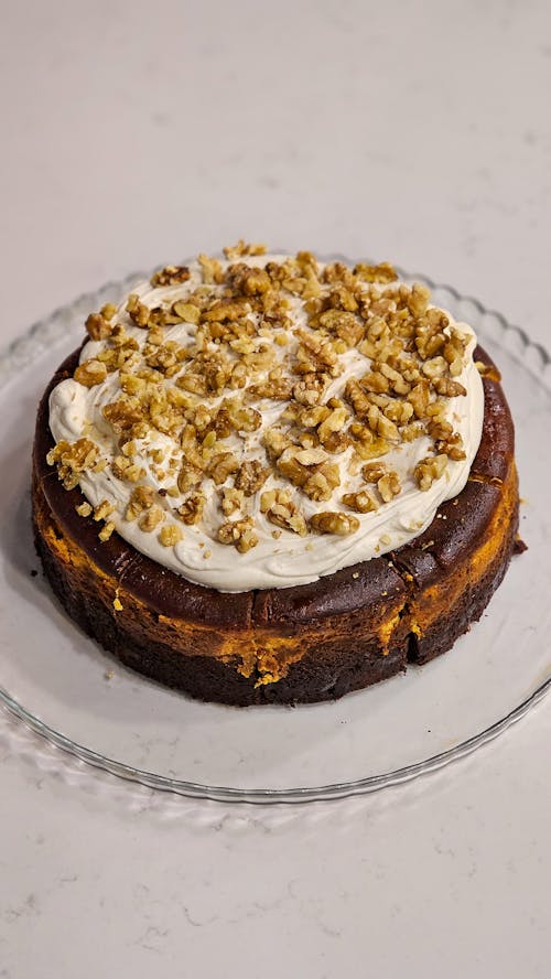 Cake with Cream and Walnuts on Top
