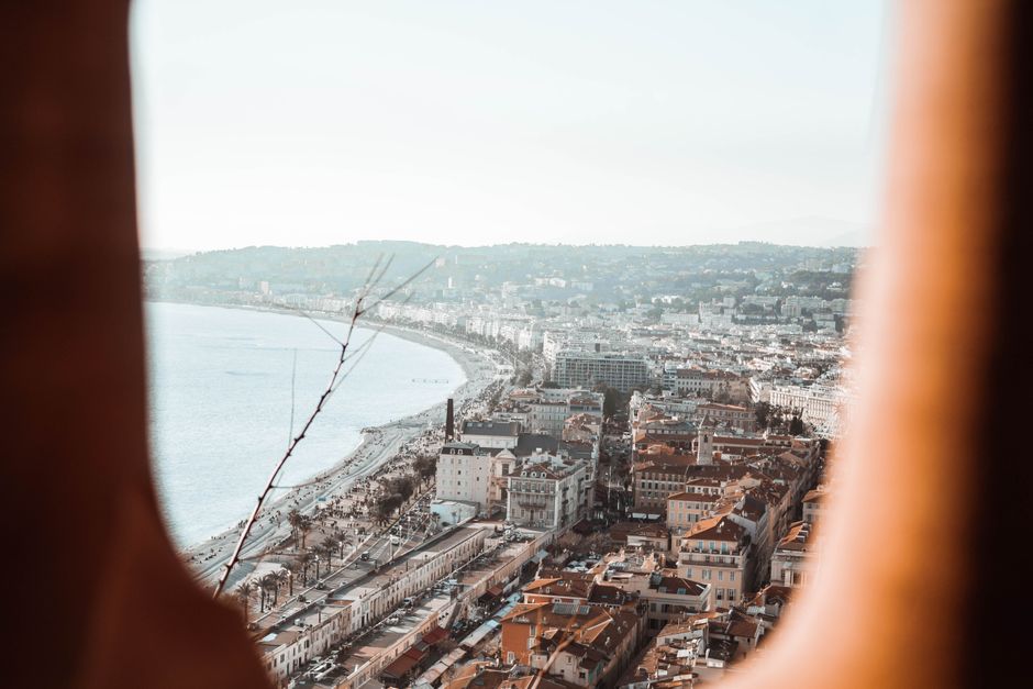 A breathtaking aerial view of Nice, France, showcasing the beautiful coastline and cityscape along the French Riviera.