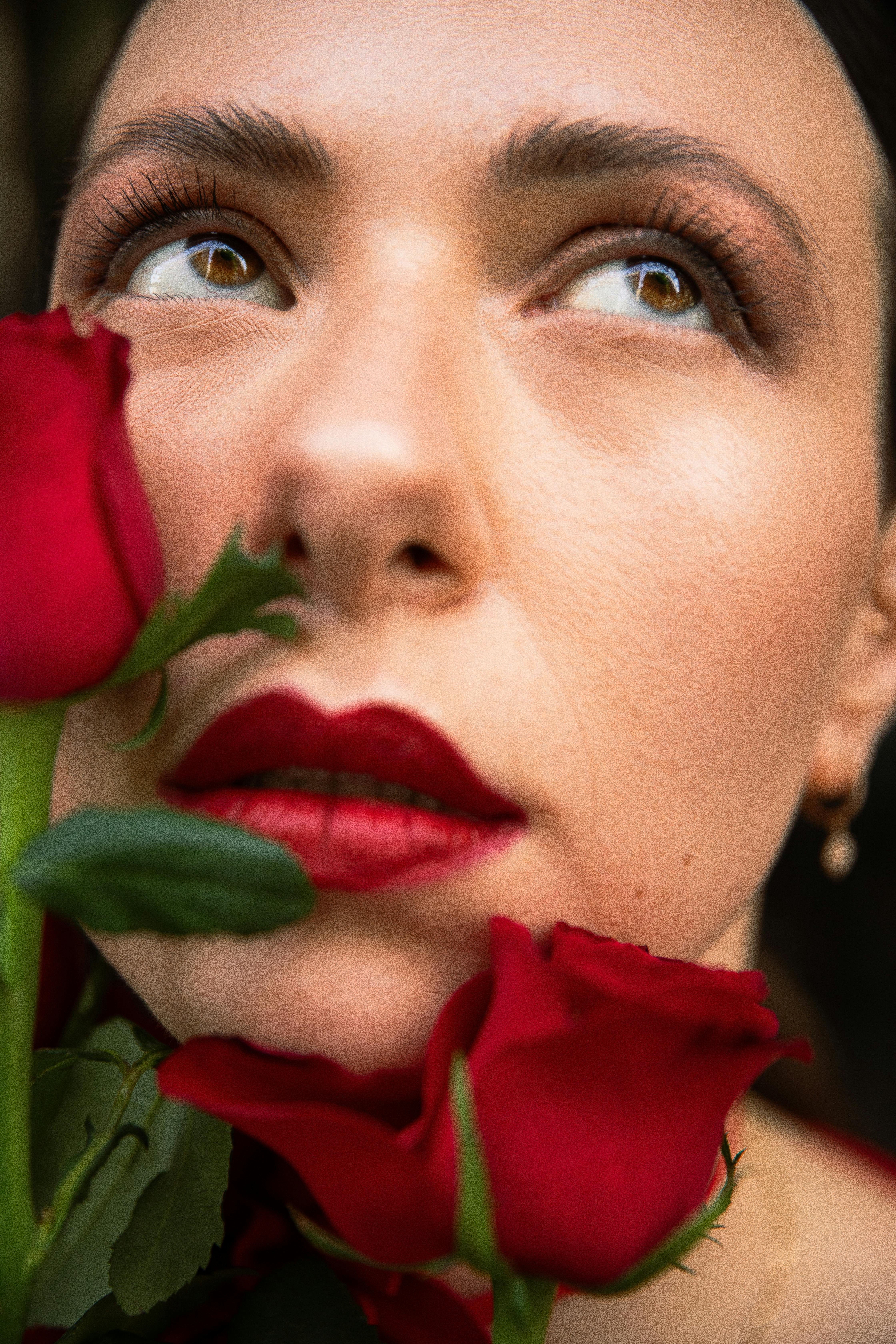 Portrait of Woman with Red Roses