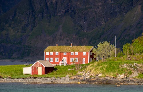 Red Rural House by Lake
