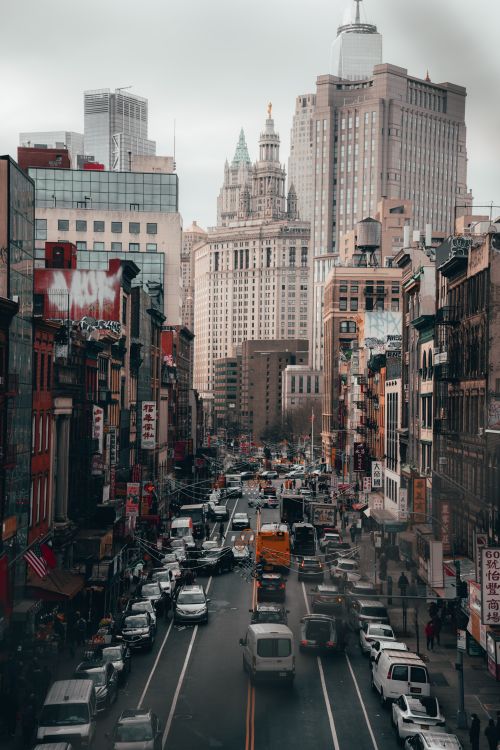 Free A bustling street scene with heavy traffic against the backdrop of New York City skyscrapers. Stock Photo