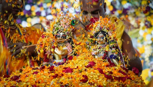 Yellow Petals around Hindu Goddesses Figurines