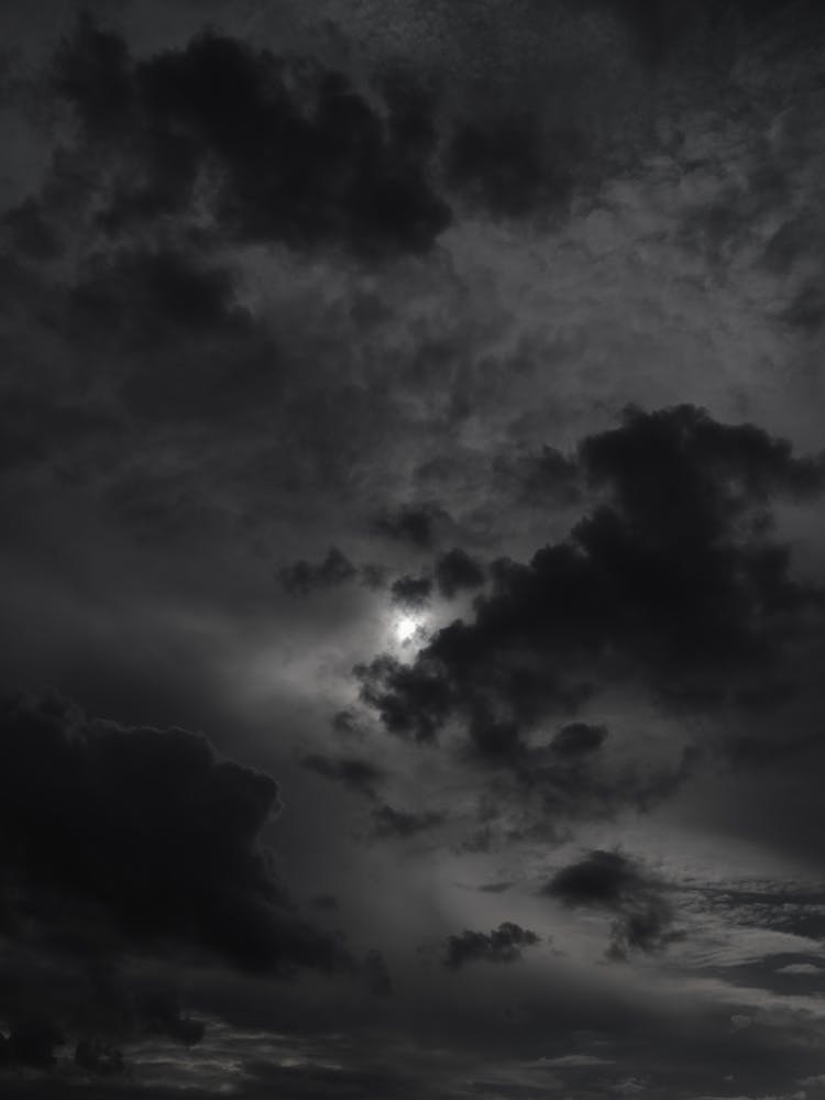 Moon Behind Clouds At Night