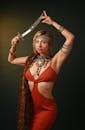 Portrait of Woman in Red Dress and with Dagger