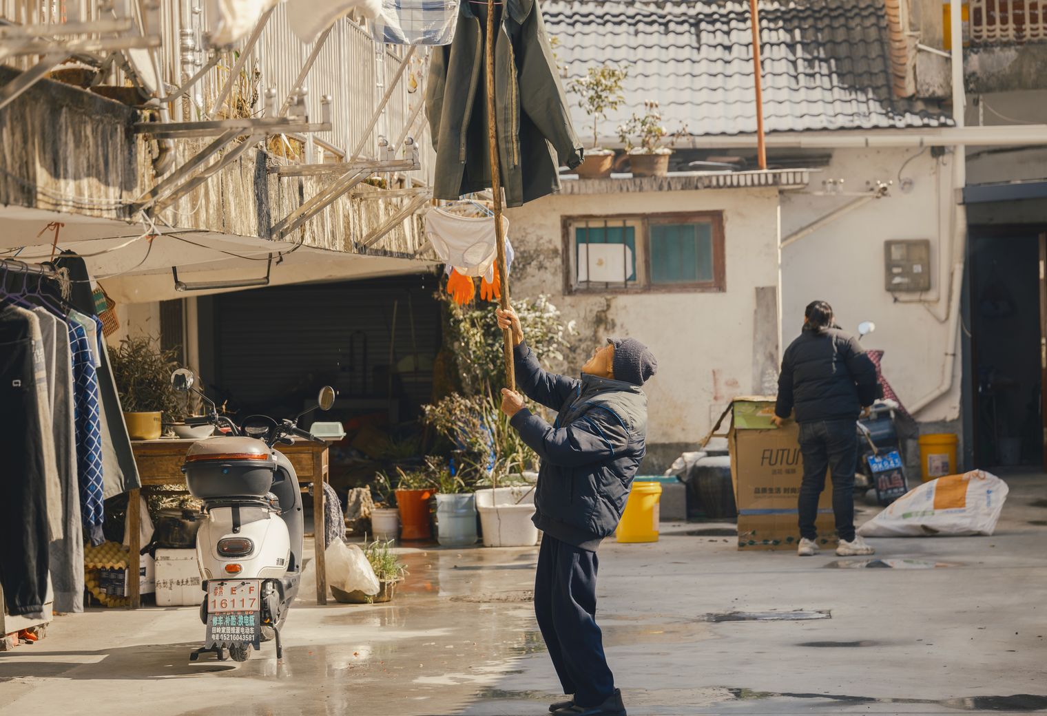 Wales — man and van team loading a removal van