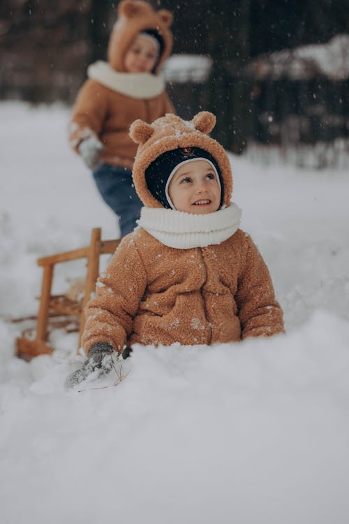 Child on Sled in Winter 
