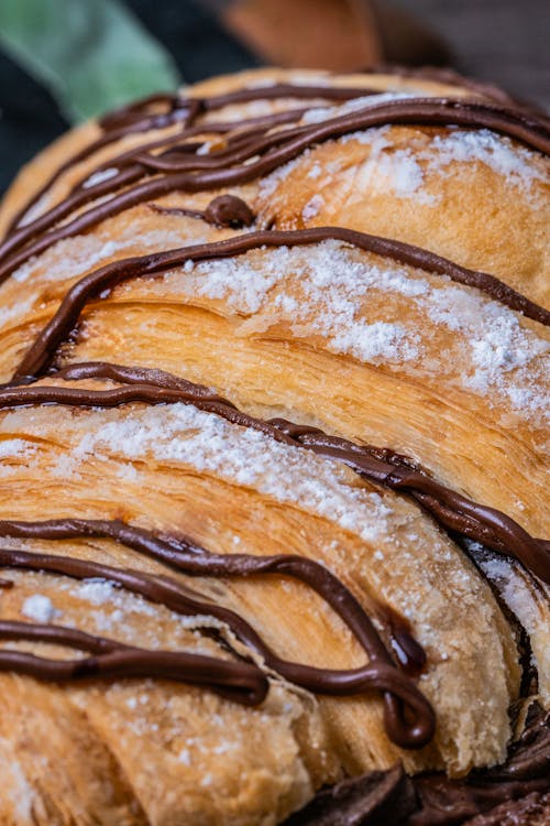 Free Cake with Powdered Sugar and Chocolate on Top Stock Photo