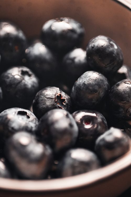 Free Juicy fresh blueberries with a selective focus, showcasing natural abundance and texture. Stock Photo