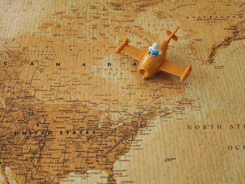 Toy Airplane on Map of North America