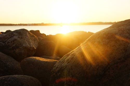 Stones on the Bay Shore in the Light of the Setting Sun