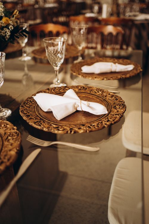 Free Beautiful vintage table setting with ornate plates and folded napkins, perfect for weddings. Stock Photo