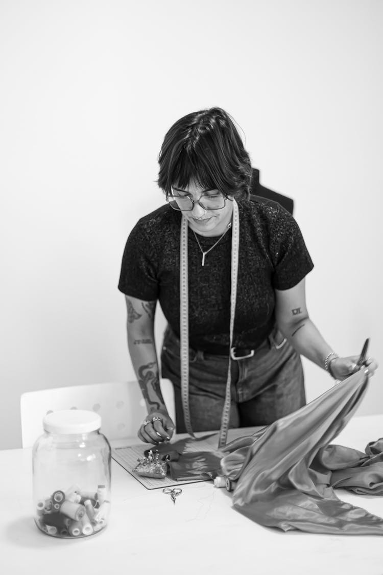 Seamstress Preparing Fabric For Sewing