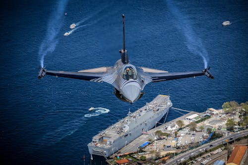 F-16C Fighter Flying over a Turkish Navy Warship