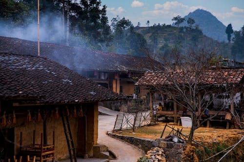 A village with smoke coming out of it
