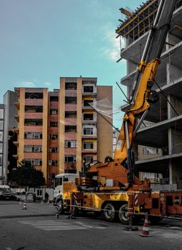 Dynamic city construction scene with crane and unfinished buildings in Istanbul.