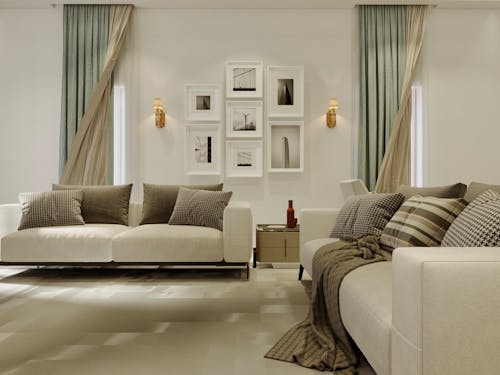 Interior of a Clean Living Room with Two Sofas, Curtains and Pictures Hanging on a Wall