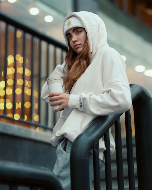 Woman in White Hoodie
