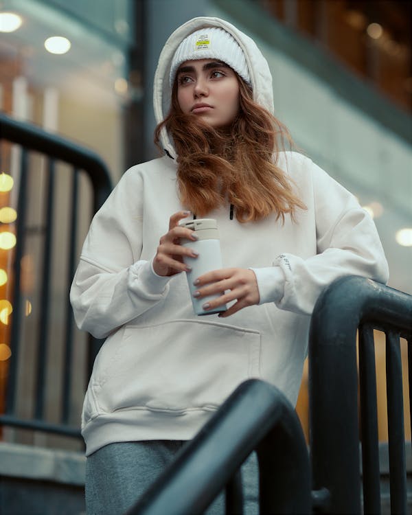 Portrait of Woman in White Hoodie
