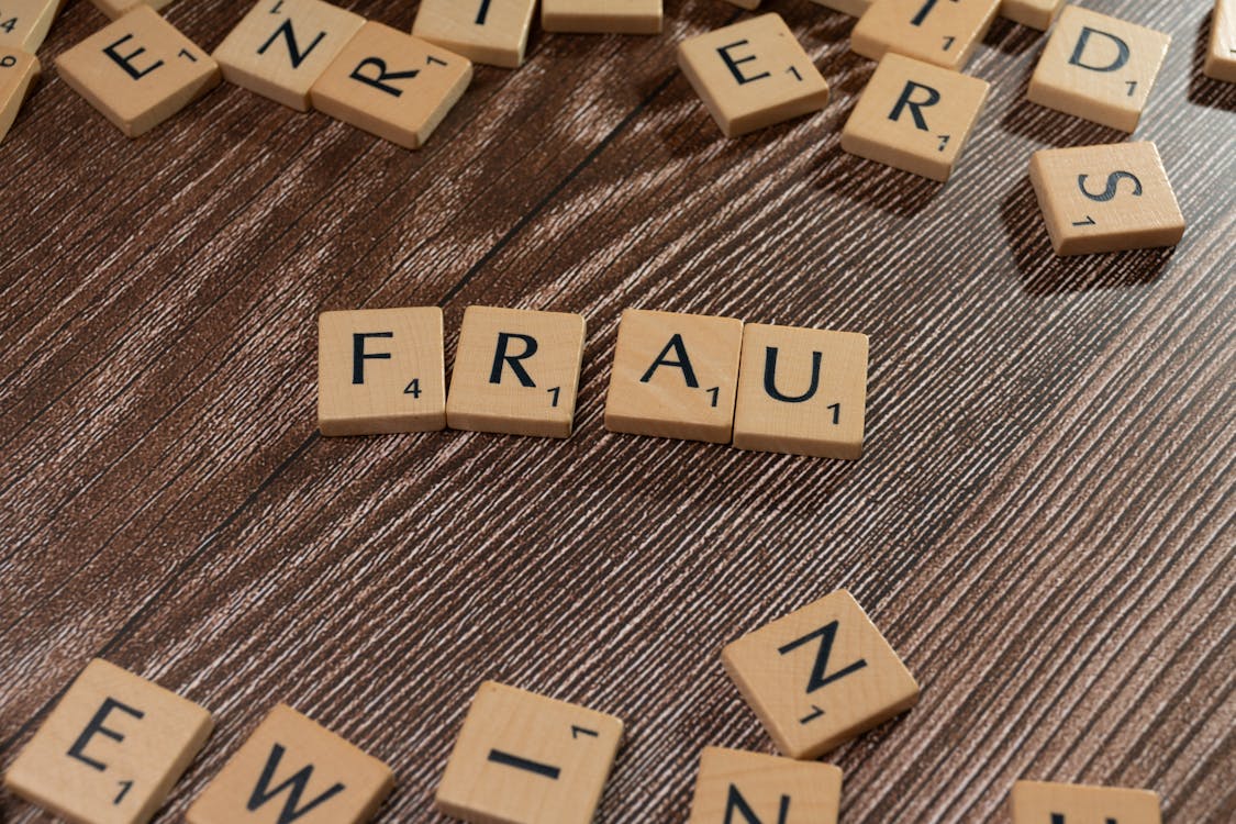 The word fraud is spelled out in scrabble letters