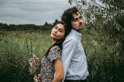 Free Couple at Green Grass Stock Photo