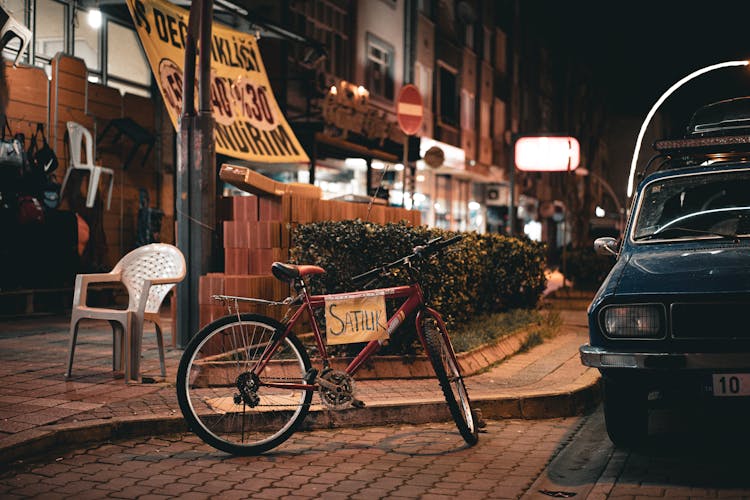 Bike For Sale On Street At Night