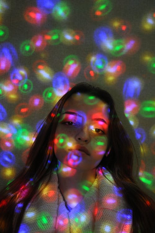 Colorful Lights around Woman