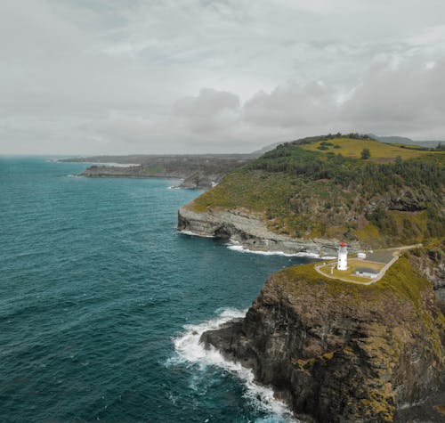 White Lighthouse on Cliff