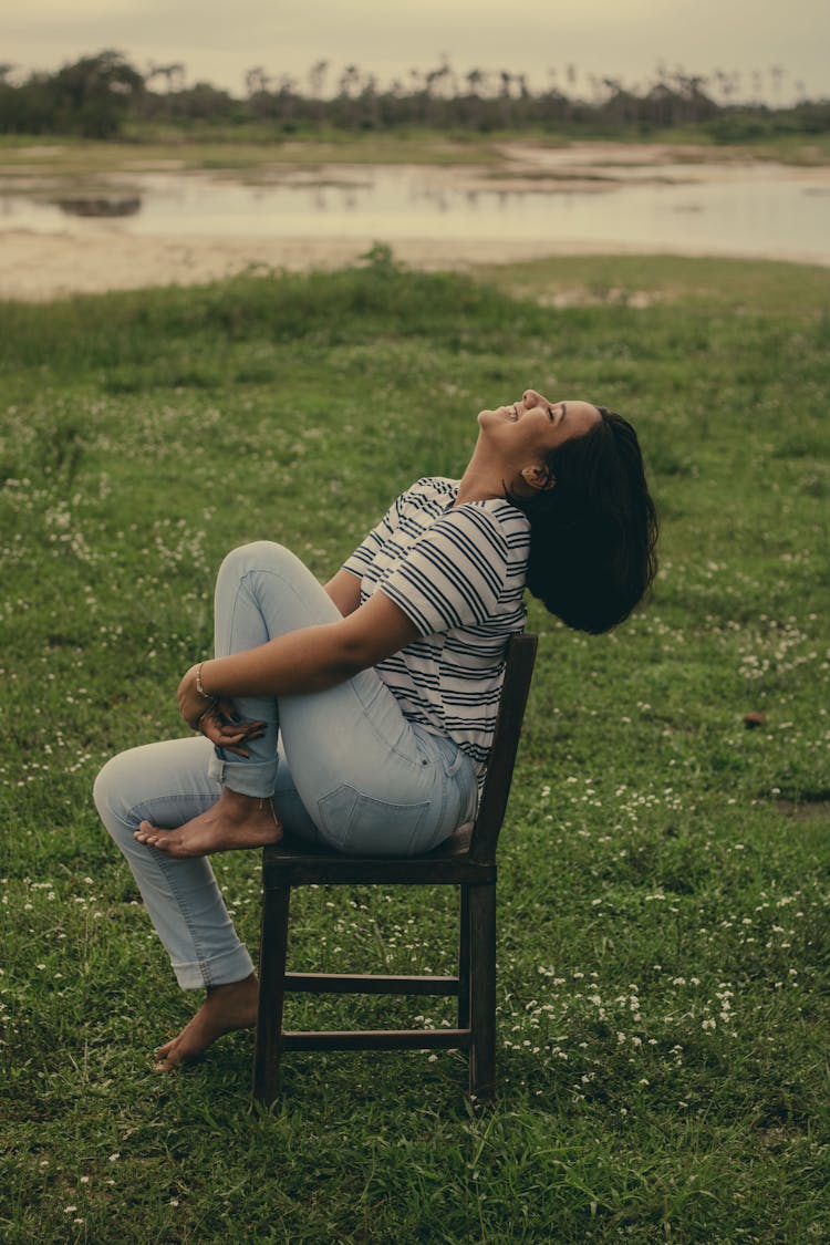 Woman Sitting On Chair