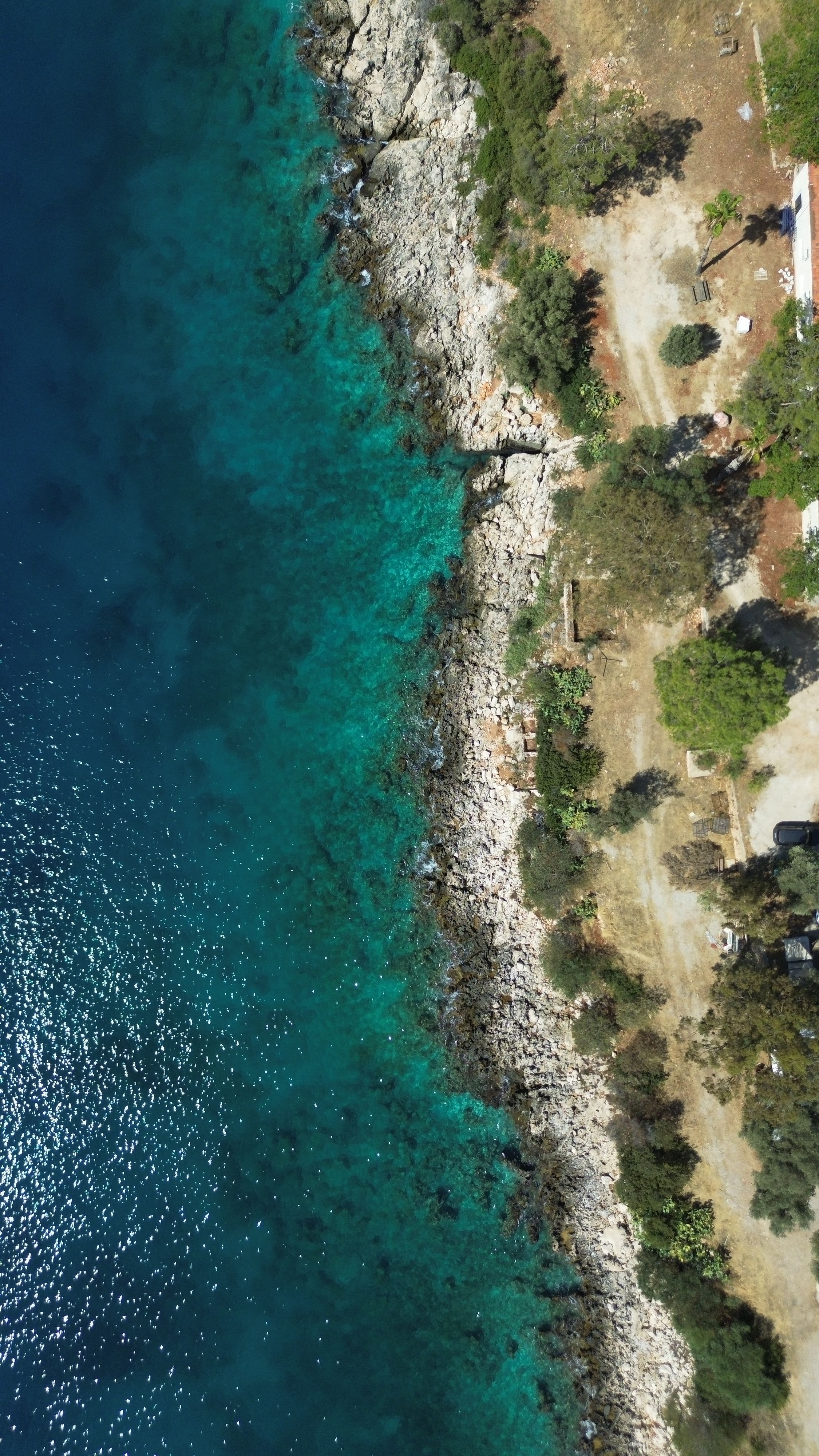 Aerial View of Rocky Coastline · Free Stock Photo