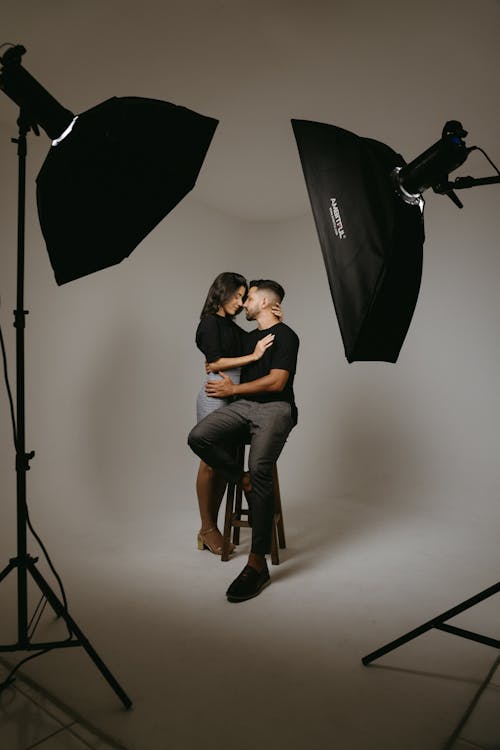 Studio Shot of a Young Couple Embracing 