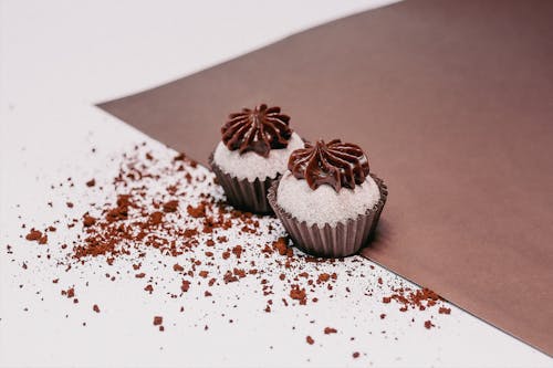 Gratis stockfoto met chocolade, cupcakejes, detailopname