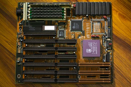 Close-up view of a vintage motherboard showcasing intricate circuitry and components.