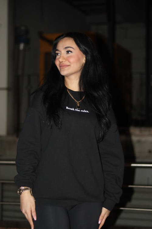 Smiling Woman in Black Pullover