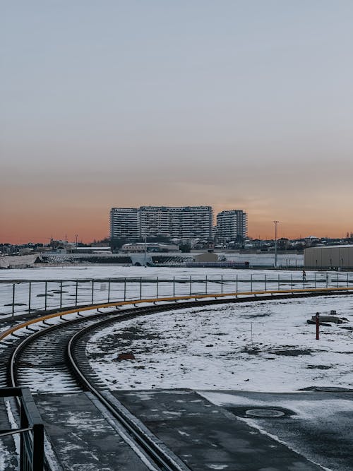 Railway Track in Town at Sunset