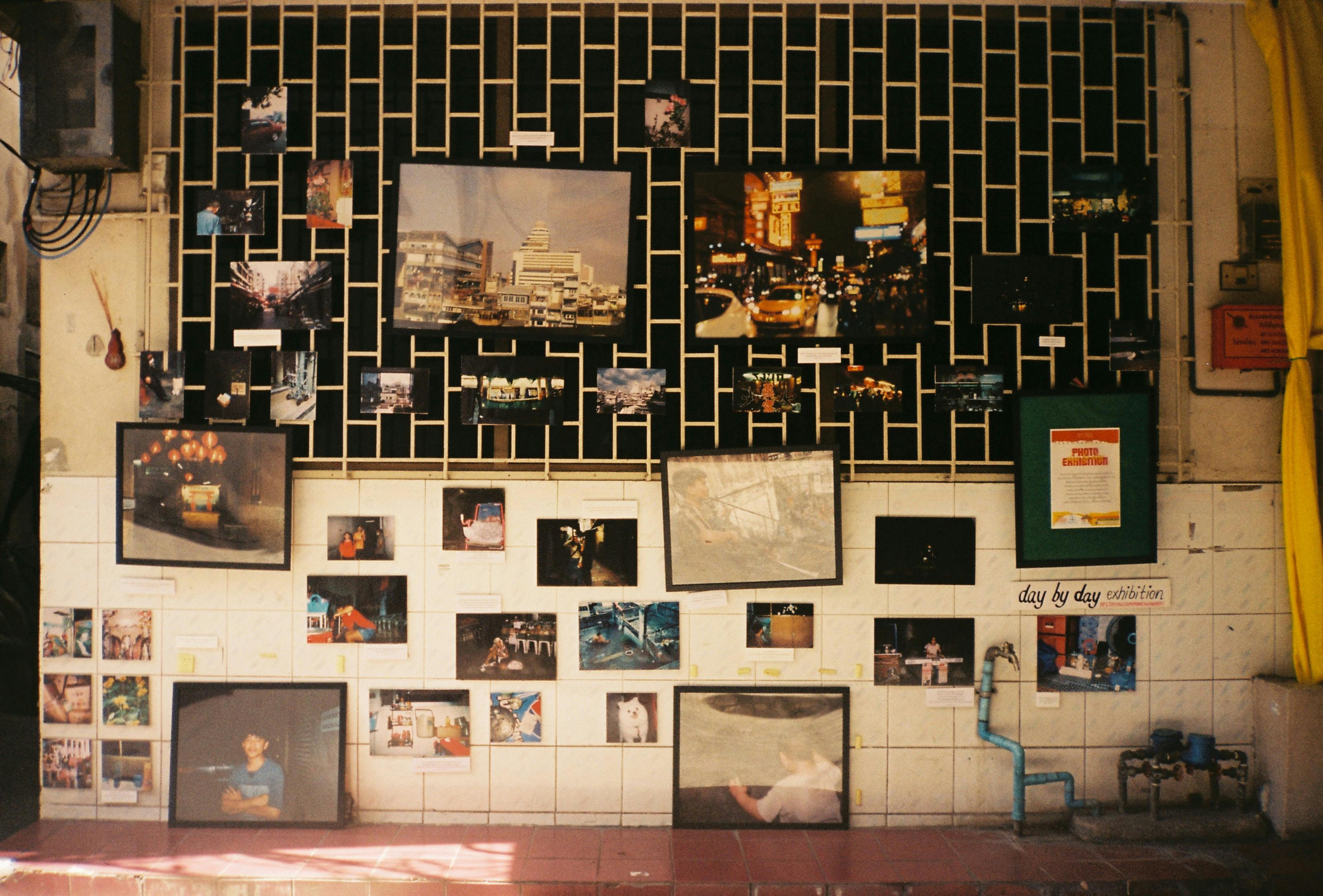 Large exhibition space with modern display wall and Kolkata cityscape backdrop