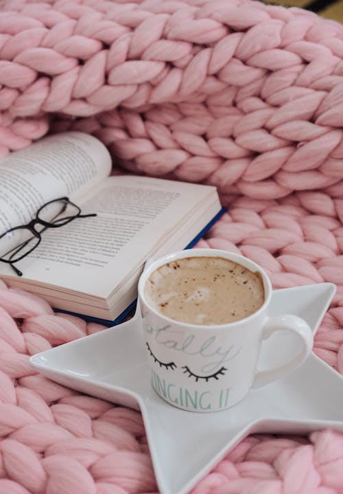 Free Coffee and Book on a Blanket  Stock Photo