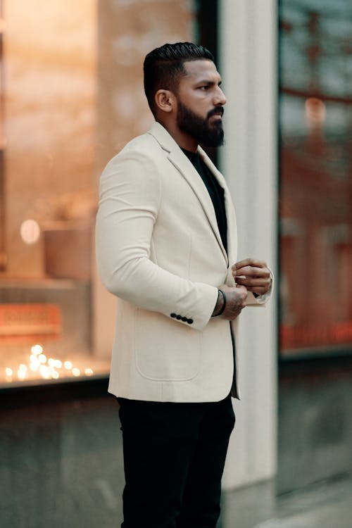 Brunette Man in White Suit