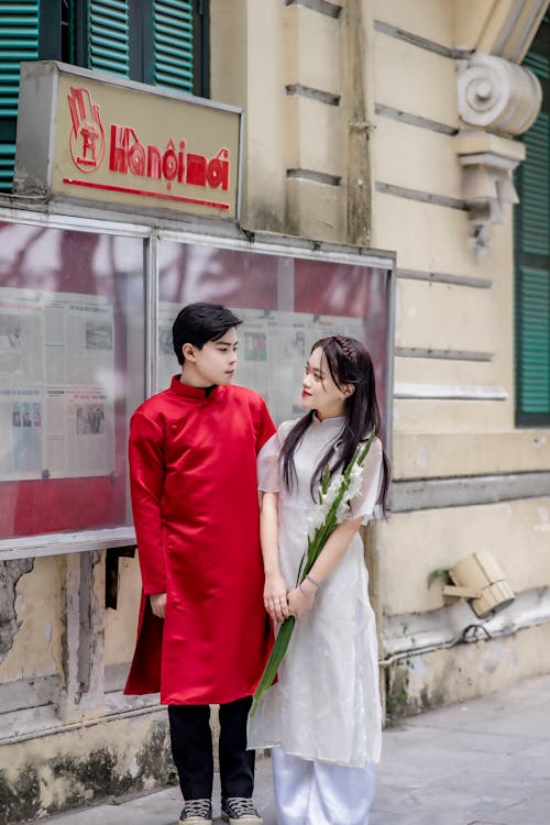 Couple on a Bus Stop in Asia 