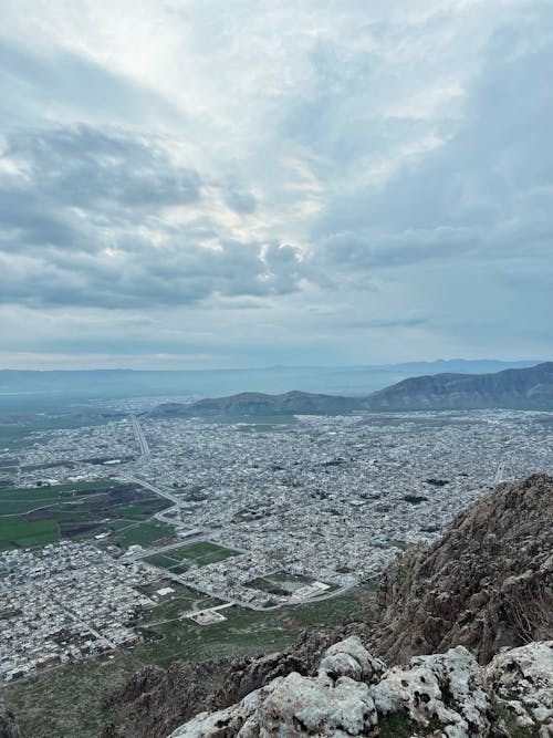 View of a City in the Valley Photographed from Rocky Mountains 